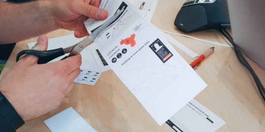 Scissors and paper was used to create a paper prototype for the new site