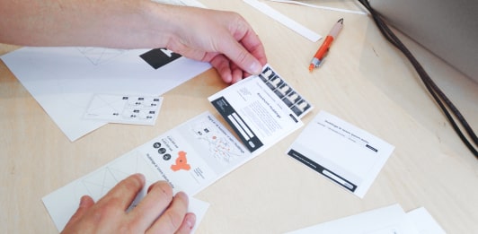 Scissors and paper was used to create a paper prototype for the new site